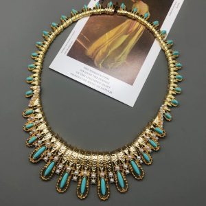 KEQIU Vintage Faux Turquoise Bib Statement Necklace, Antique Gold Tone Faux Pearl Collar Necklace, Retro Egyptian Revival Costume Jewelry  >